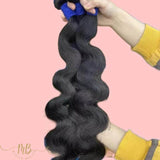 Tissage de cheveux humain boucles wave